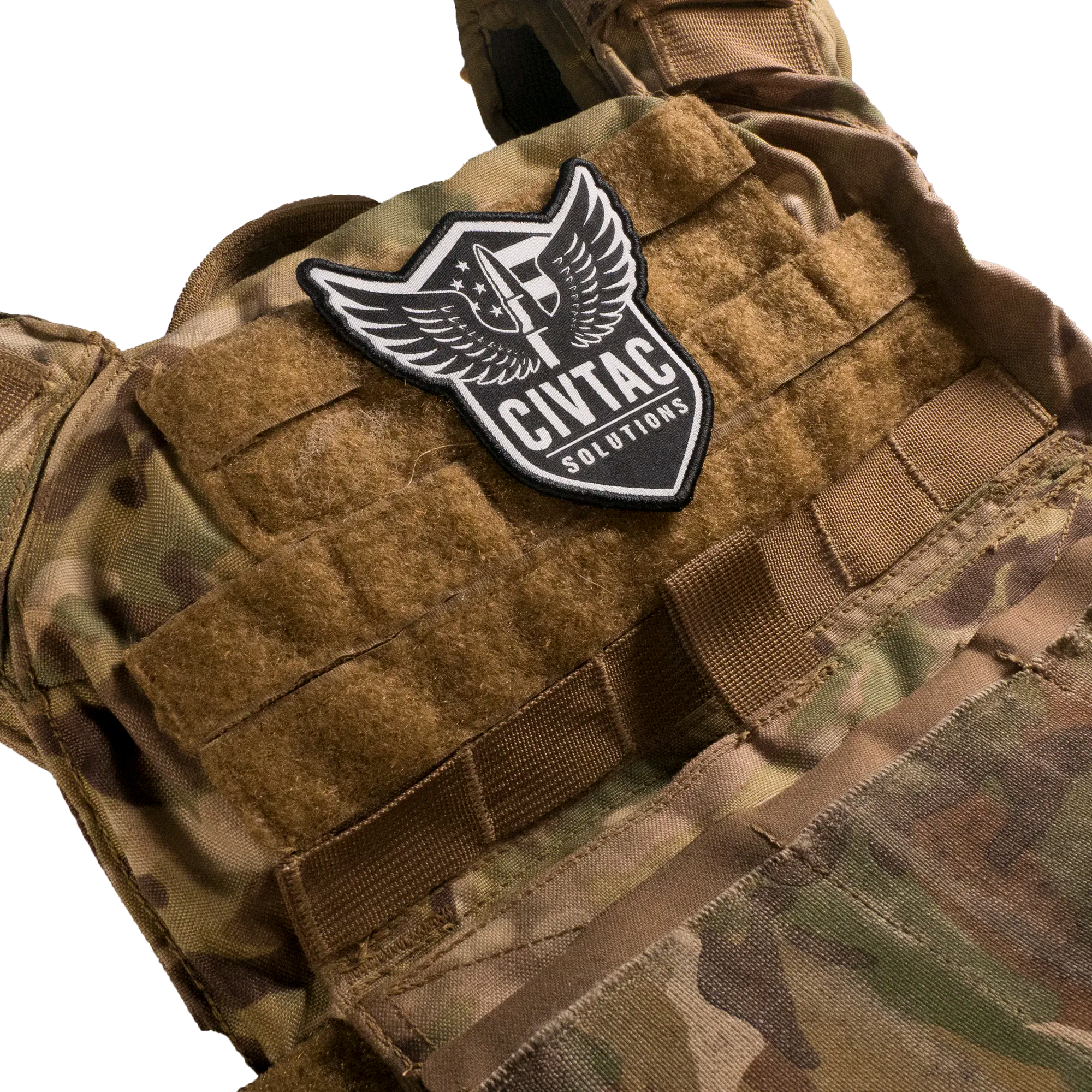 Camouflage tactical vest with a CIVTAC Solutions patch on a white background