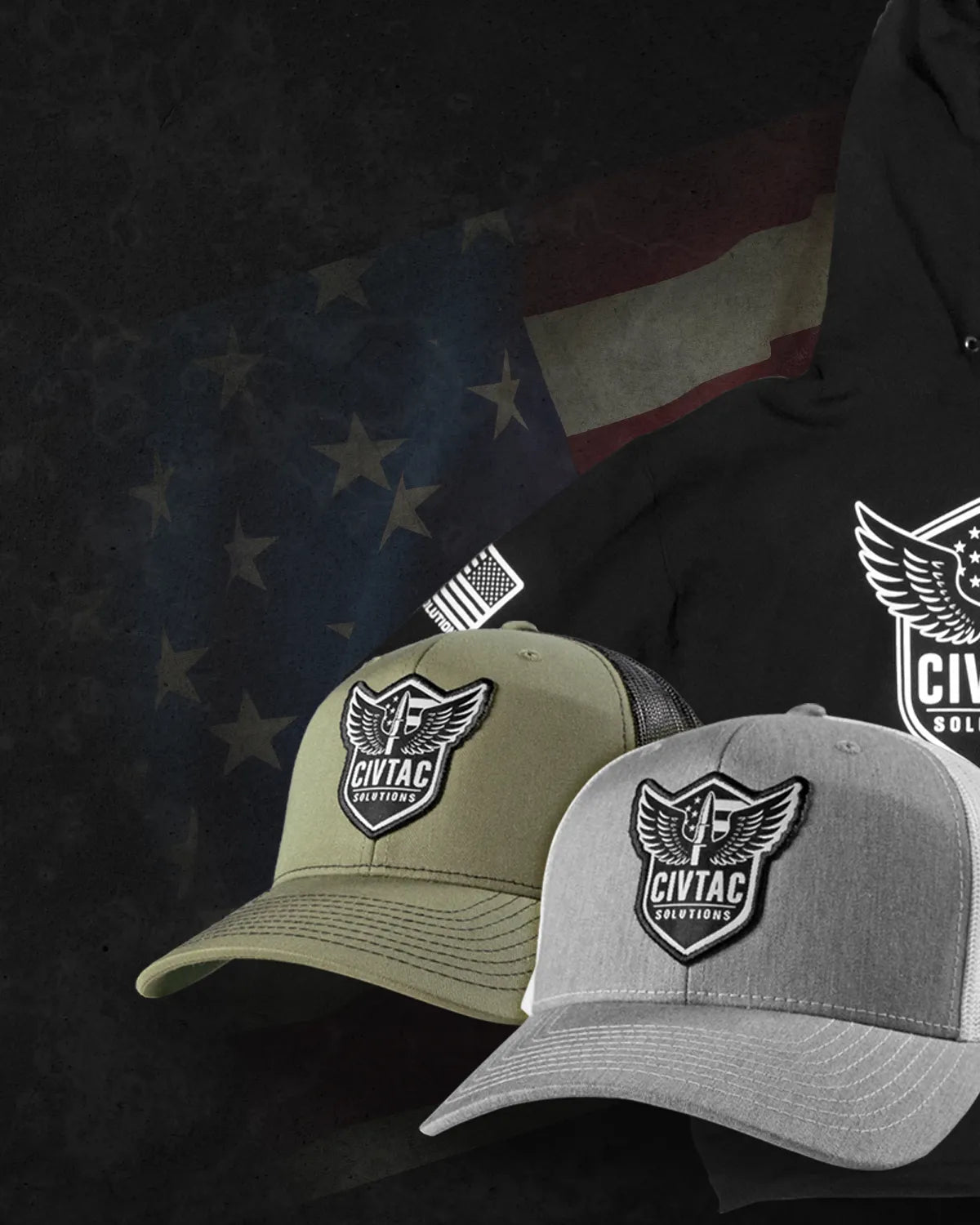 Two "The Veteran" hats on a dark background with American flag.